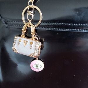 Gold and White Keychain with Eye Charm. New